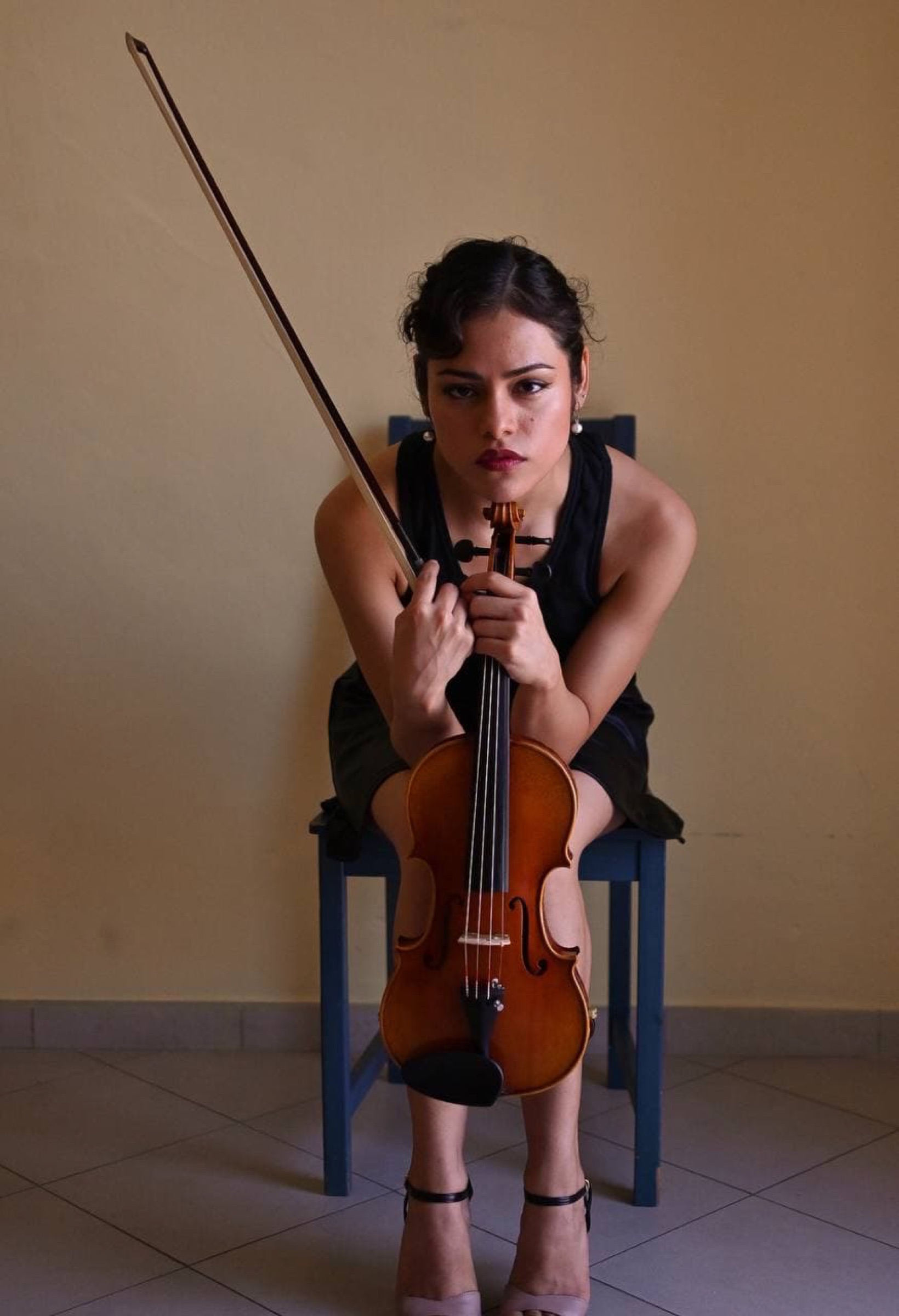 Violinist는 편집 초상화에 앉아